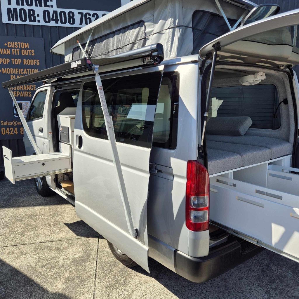 hiace poptop exterior rear with slideouts and awning