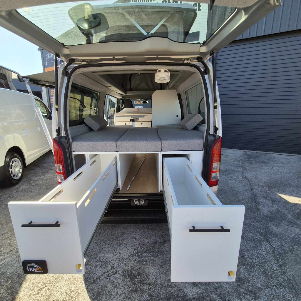 hiace campervan with rear slideouts and bed